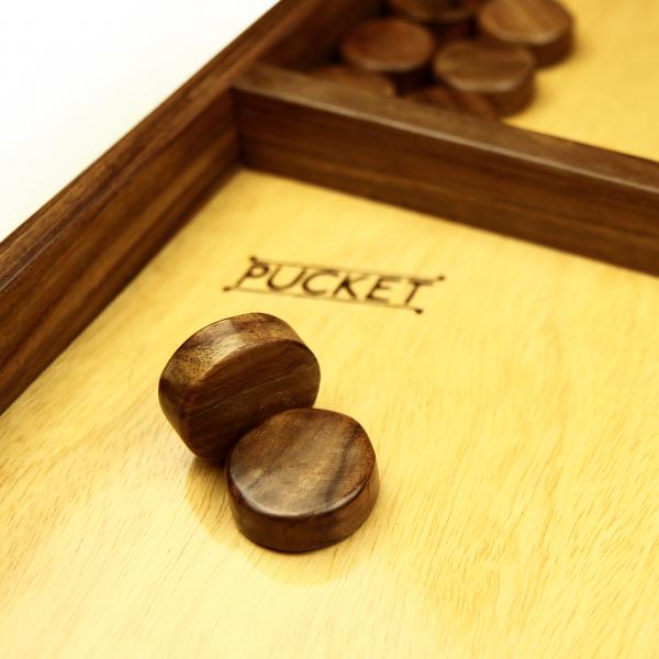 Pucket lettering and pucks